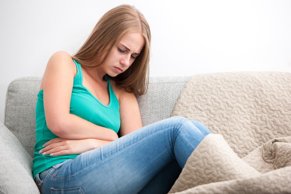 Почему возникают боли в животе на ранних сроках беременности