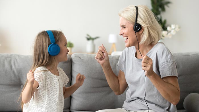 Happy mother and her daughter singing a counting song