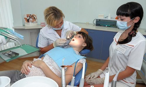 Процесс лечения зубов беременной женщине